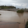 Punta de la crecida del río Guadiana a su paso por Badajoz y Caya