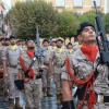 La lluvia respeta el toque de retreta militar