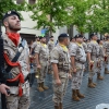 La lluvia respeta el toque de retreta militar