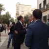 Imágenes de la llegada del ministro a Badajoz y del acto del Cupón de la ONCE