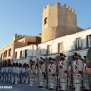 Retreta militar por el casco antiguo con motivo de la Fiesta Nacional