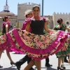 GALERÍA II - Las agrupaciones del Festival Folklórico realizan el tradicional desfile por las calles de Badajoz