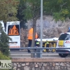 Un policía encuentra a un joven tirado en el suelo cerca de Puerta de Palmas