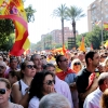Multitud de pacenses celebran el día de la Fiesta Nacional en Badajoz