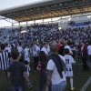 Los blanquinegros celebran la permanencia en el césped del Nuevo Vivero