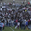 Los blanquinegros celebran la permanencia en el césped del Nuevo Vivero