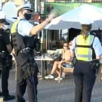 Policías españoles y alemanes patrullan para reforzar la atención al turista en España