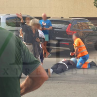 Herida una mujer al caer de su moto tras un accidente en Badajoz